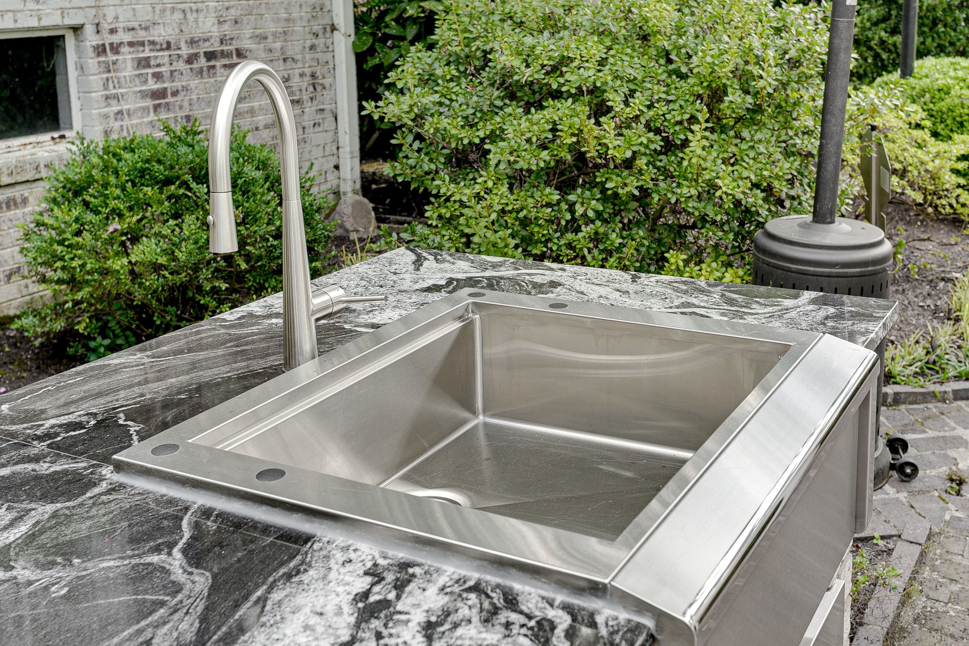 Marble Luxury Outdoor Stainles Steel Sink with White Washed Exposed Brick Home